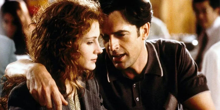 Julia Roberts as Julianne with Rupert Everett's George's hand around her shoulders in My Best Friend's Wedding