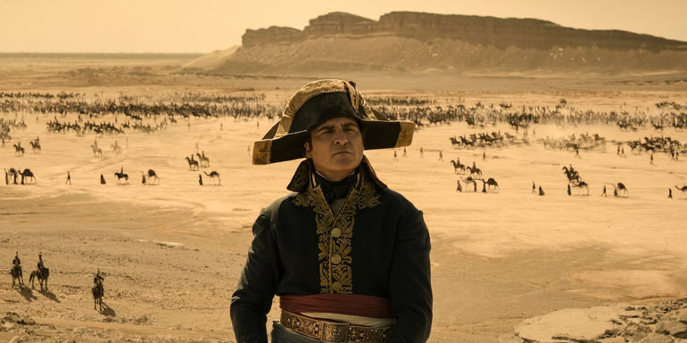 Joaquin Phoenix as Napoleon stands on a battlefield in Egypt in Ridley Scott's Napoleon