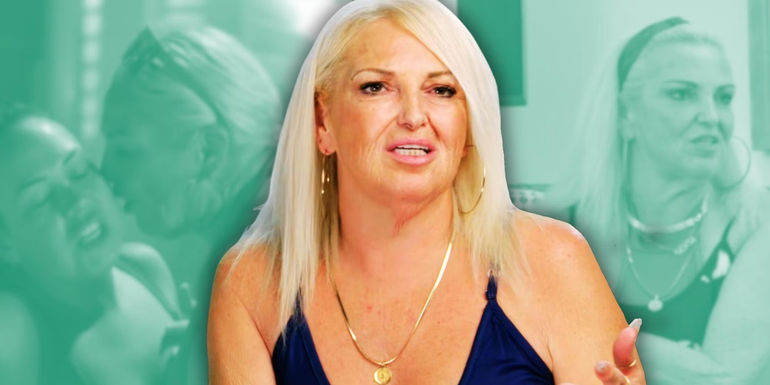 Angela Deem from 90 Day Fiance wears black shirt and gestures in front of green background photos of her