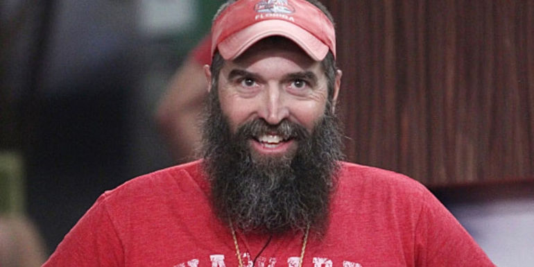 Donnt Thompson siling at the camera in Big Brother