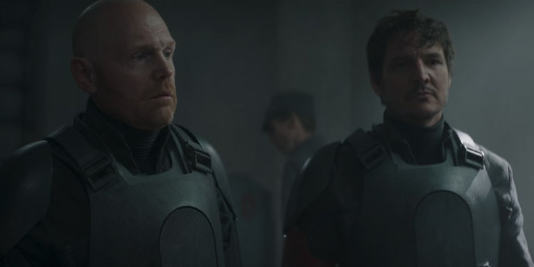 Din Djarin and Migs Mayfeld in an Imperial compound in The Mandalorian