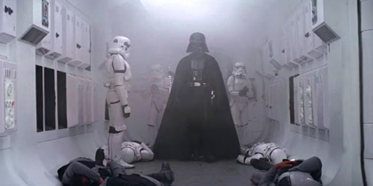 Darth Vader walking onto the Rebel ship with Stormtroopers in Star Wars: A New Hope