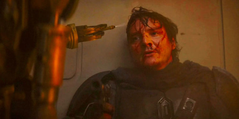 IG-11 removes Din Djarin's helmet in The Mandalorian season 1 finale