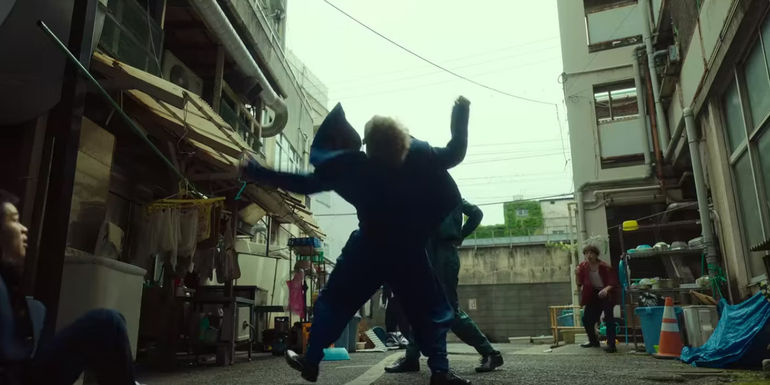 Yusuke Urameshi punches Kuwabara in Yu Yu Hakusho episode 1