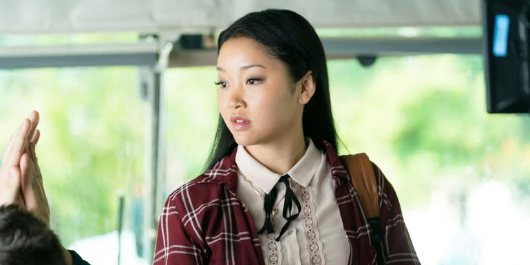 Lana Condor as Lara Jean Covey on the bus in To All the Boys I've Loved Before