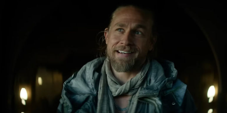 Charlie Hunnam as Kai smiling in Rebel Moon