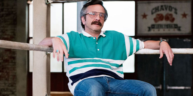 Sam Sylvia (Marc Maron) tiredly resting on the ropes in GLOW