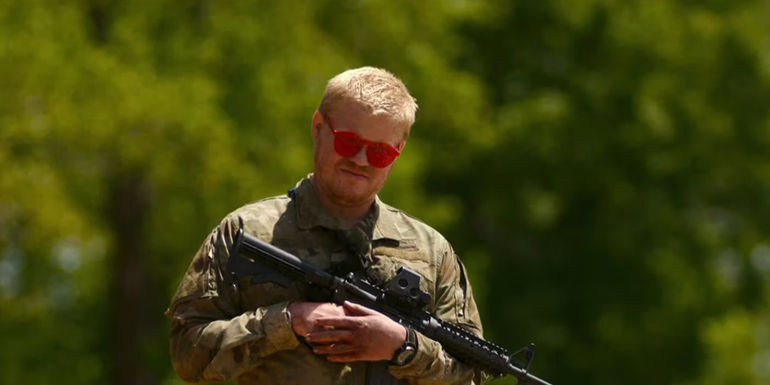 Jesse Plemons holding a rifle in Civil War