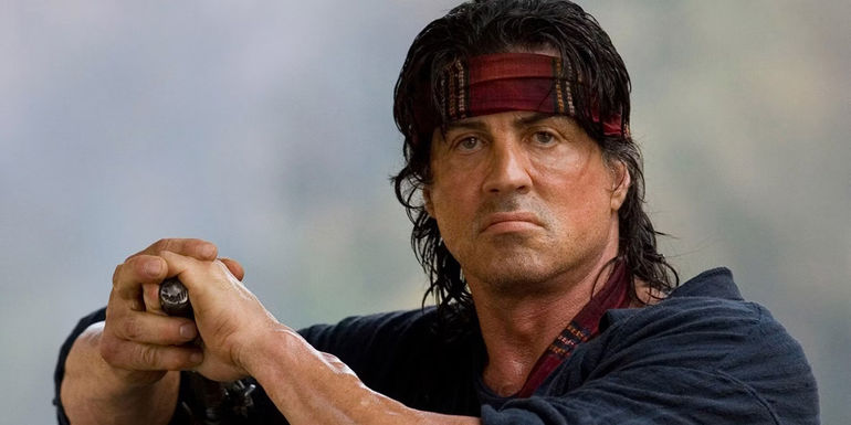 Sylvester Stallone poses as John Rambo in Rambo 2008