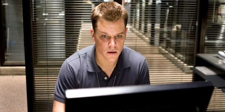 Colin on a police computer in The Departed