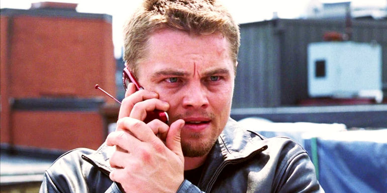 Leonardio DiCaprio holding a cellphone as Billy in The Departed.