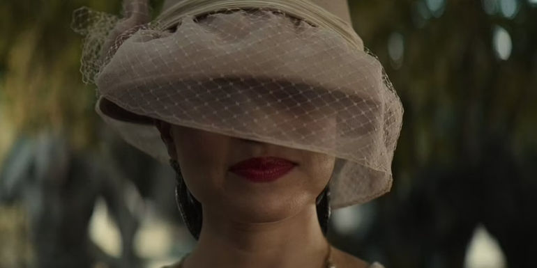 Jessica Parker Kennedy as Medusa with a white veil over her face in Percy Jackson & the Olympians episode 3