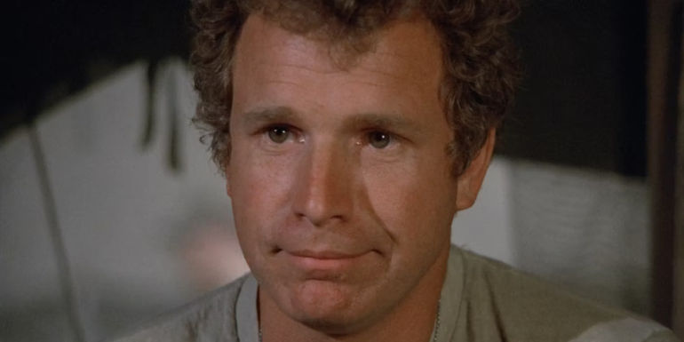 Trapper looking sad at Hawkeye in MASH