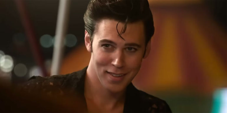 Austin Butler as Elvis Presley smiling in Elvis.