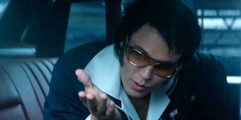 Austin Butler as Elvis Presley in a car in Elvis.