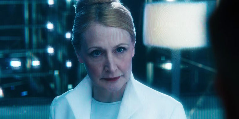 Dylan O'Brien's Thomas looks at a screen with Patricia Clarkson's Ava Paige from WCKD in the Maze Runner movies