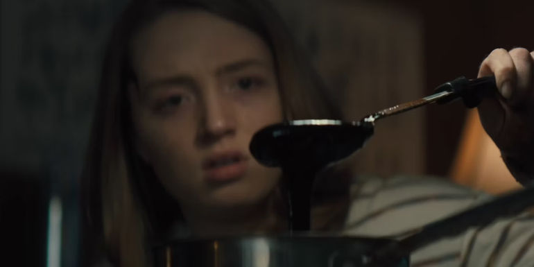 Chloe looking at food in Run