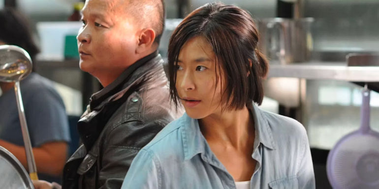 The hero and heroine face down their attackers in The Kick 2011