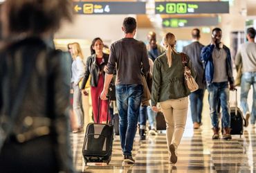 Restricting International Travel: Introducing Carbon Passports as a Viable Solution