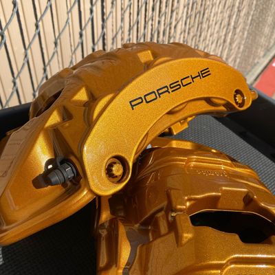 Sparkling Gold Powder Coating on Brake Calipers with Logo