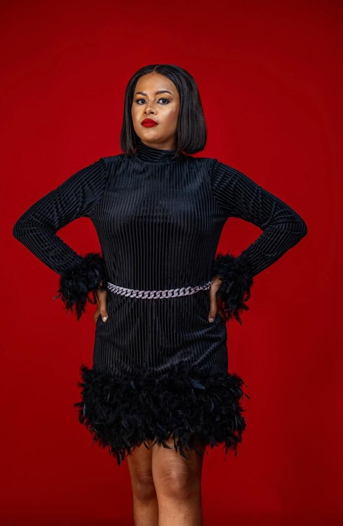 Black with feathers dress