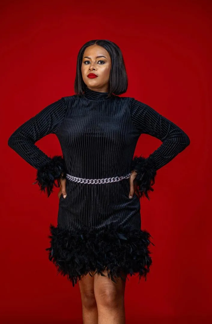 Black with feathers dress