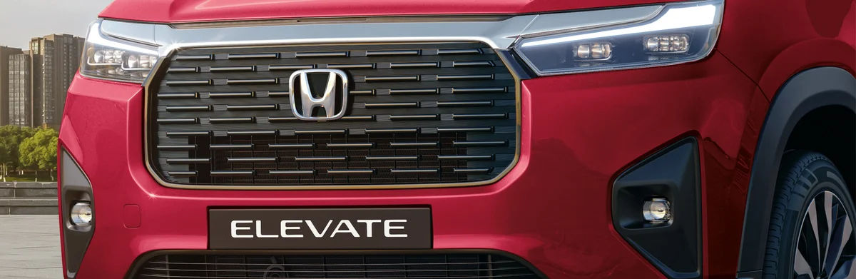 Bold Chrome & Gloss Front Grille