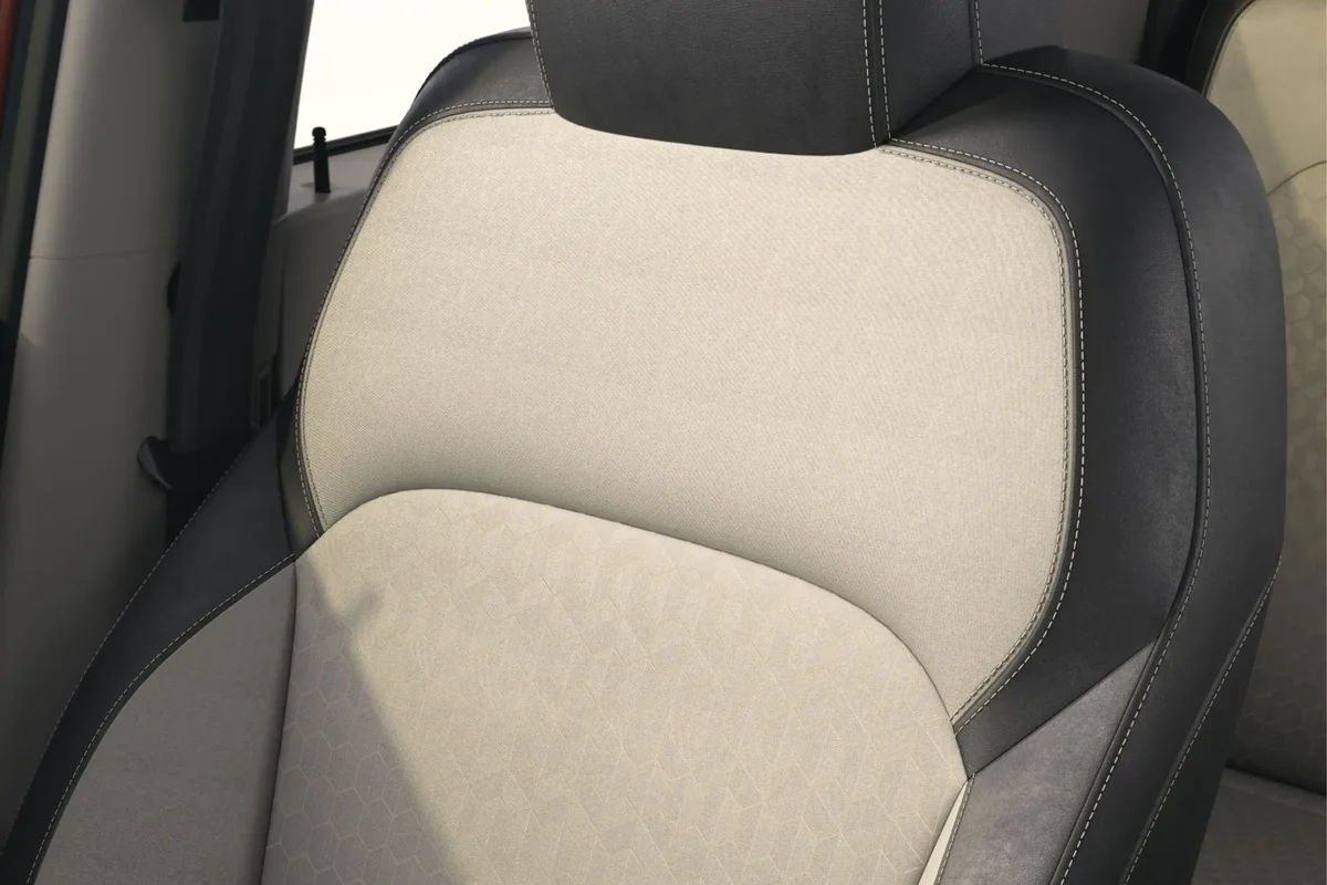 Premium Dual-Tone Quilted Seat Upholstery with Driver Armrest