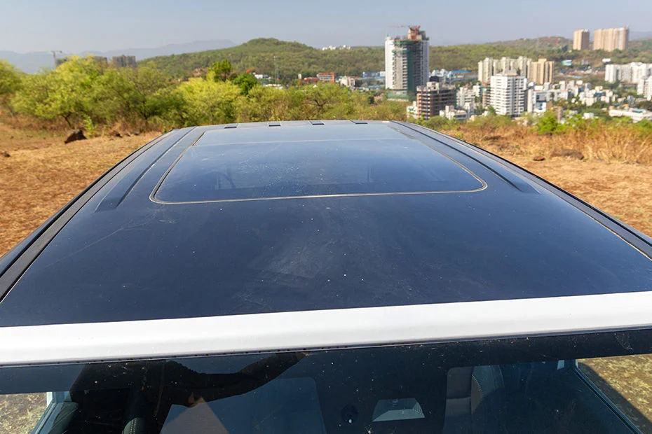 Segment-Largest Panoramic Skyroof with Acoustic Glazing & One-Touch Electric Sunblind