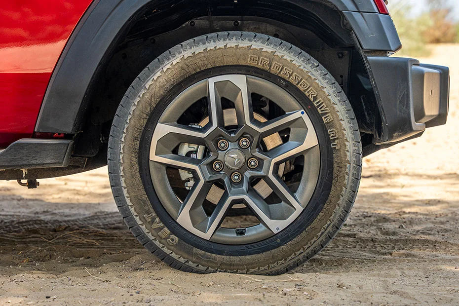 18-inch Deep-Silver All-Terrain Alloy Wheels with High-Profile Off-Road Tyres