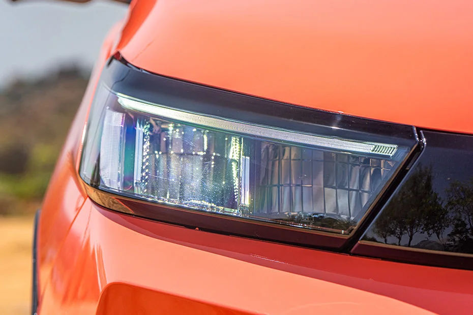 Angular Dual-Chamber Headlamps with Signature LED Daytime Running Lights (DRLs)