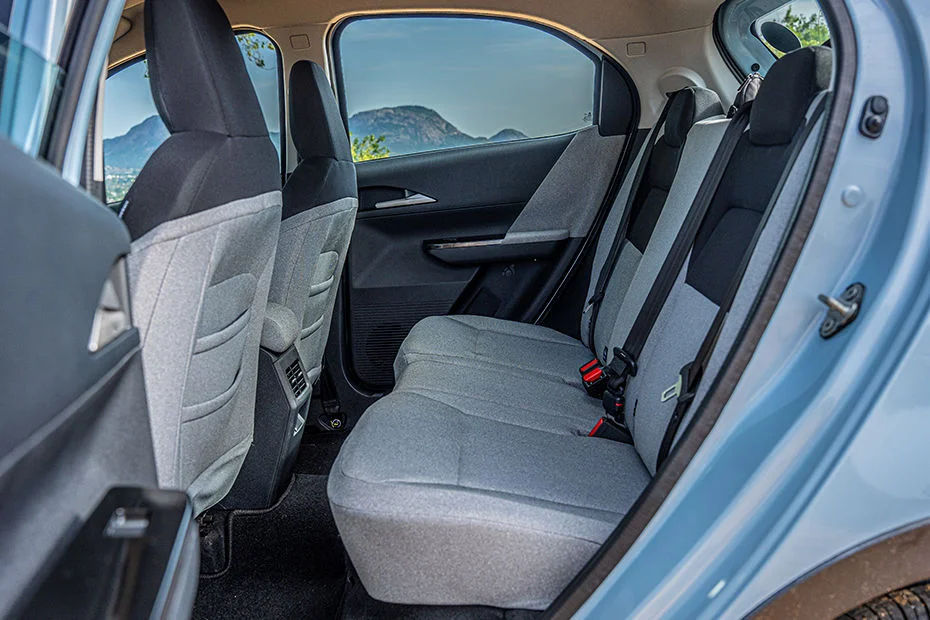 Spacious 5-Seater Cabin with Wide Rear Legroom & Integrated Headrests