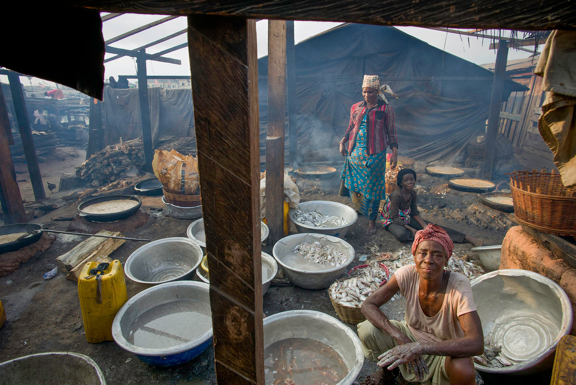 Three Women Boiling Fish