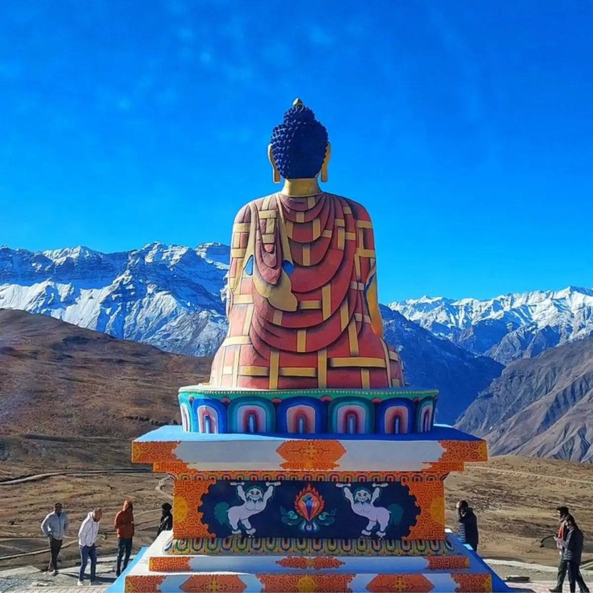 Maitreya Buddha statue overlooking the scenic Spiti Valley and Himalayan mountain ranges