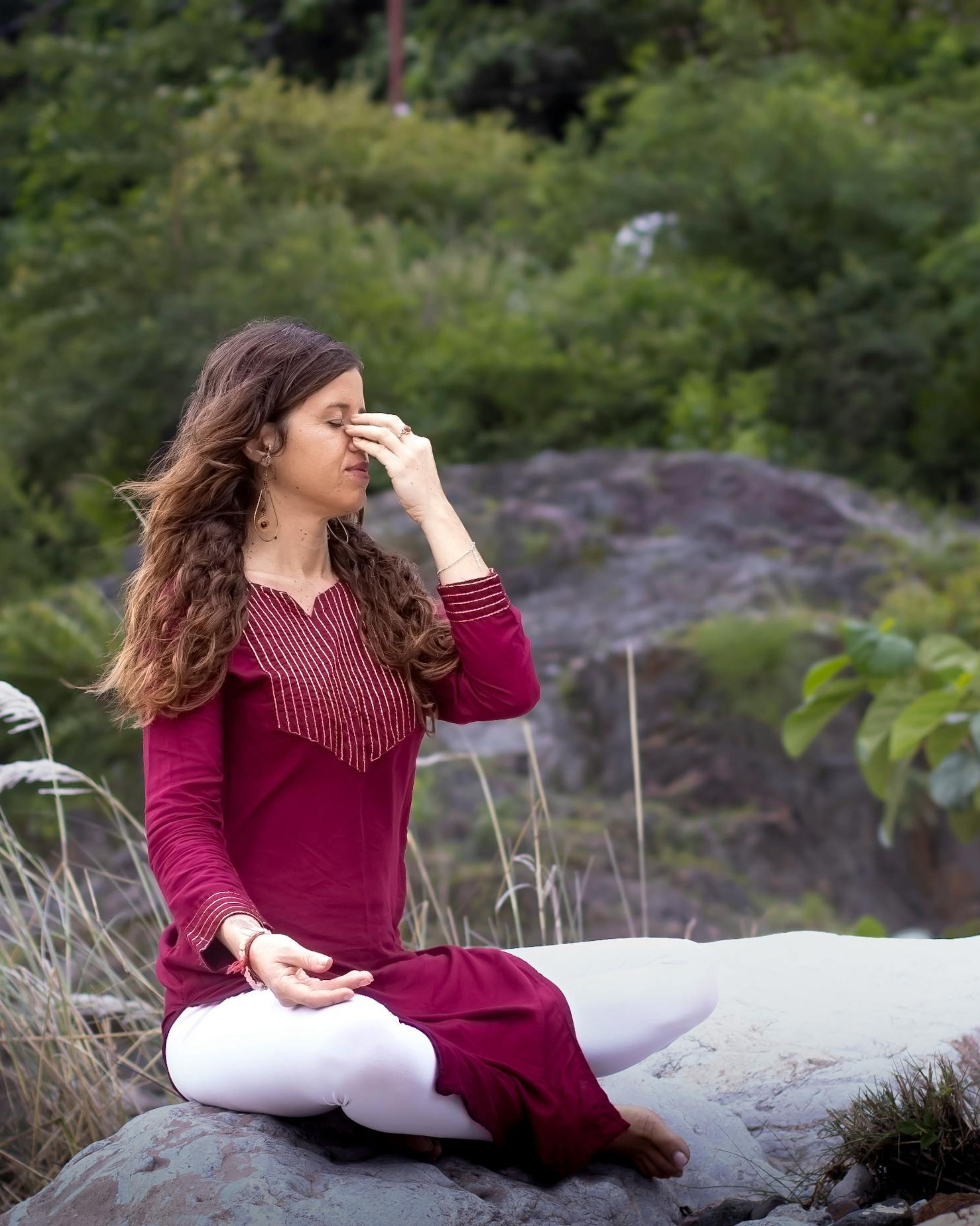 Student practicing a yoga asana at World Yoga Training