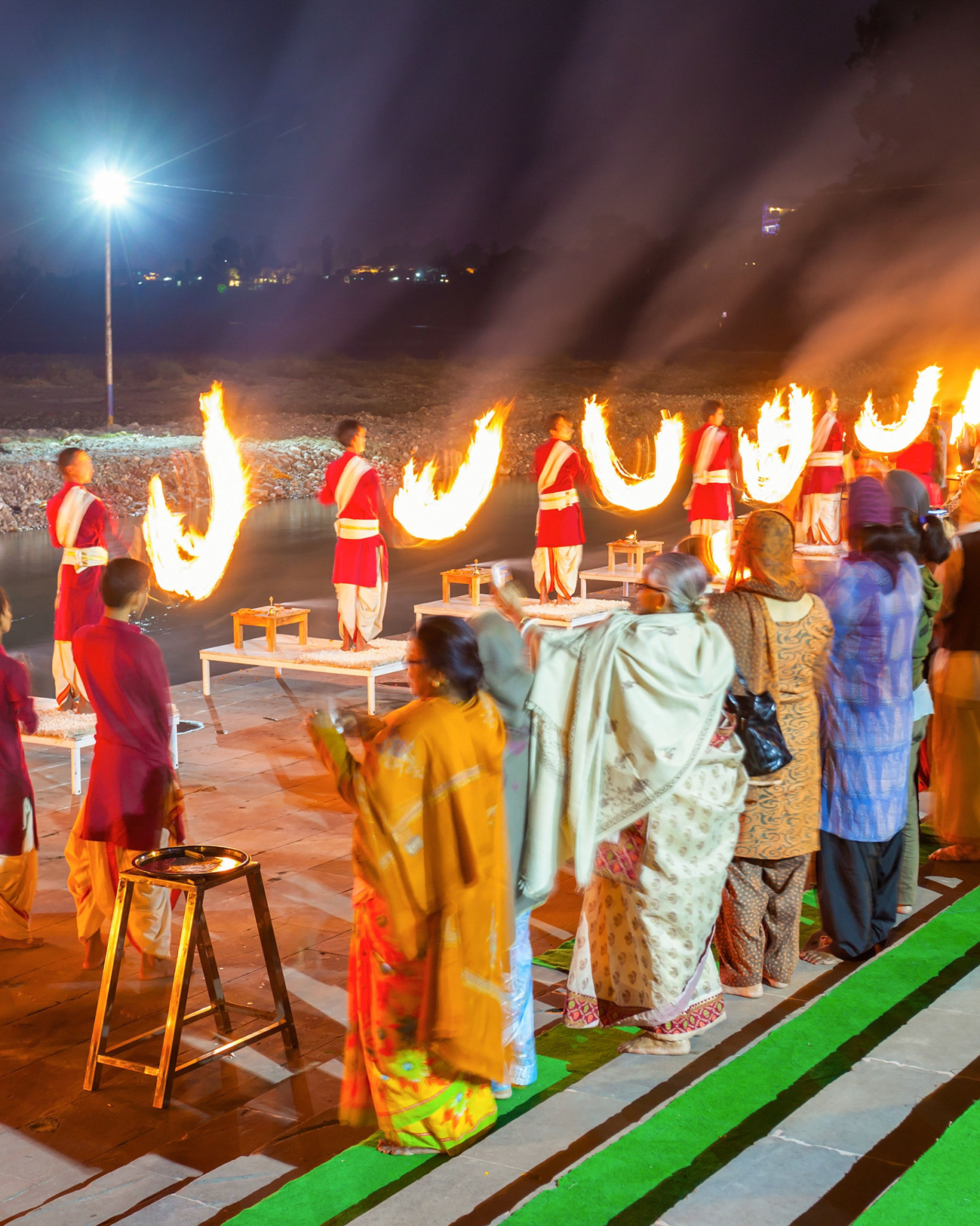 Beach yoga session along the Ganga riverbanks