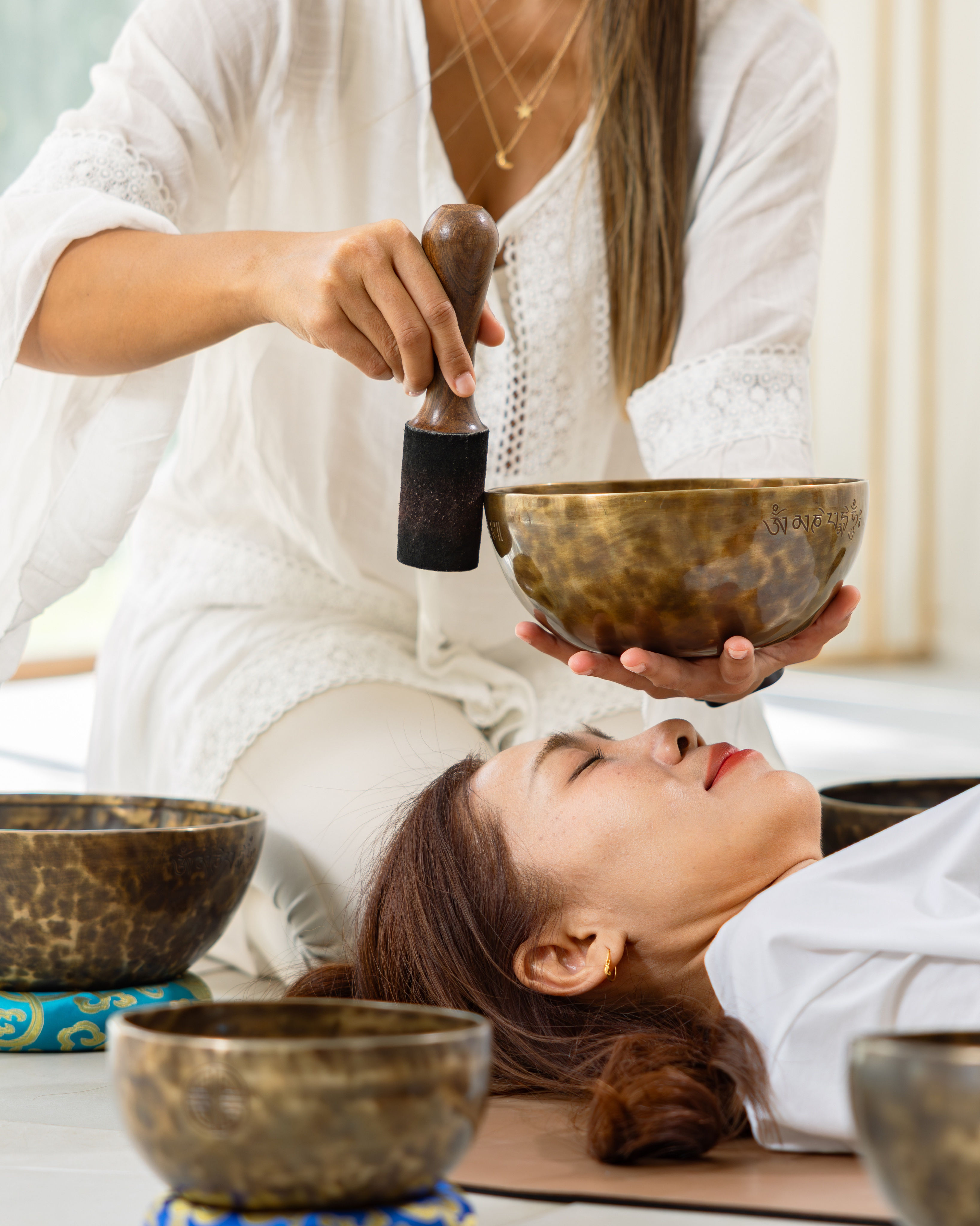 Tibetan singing bowls used in a sound healing session at World Yoga Training