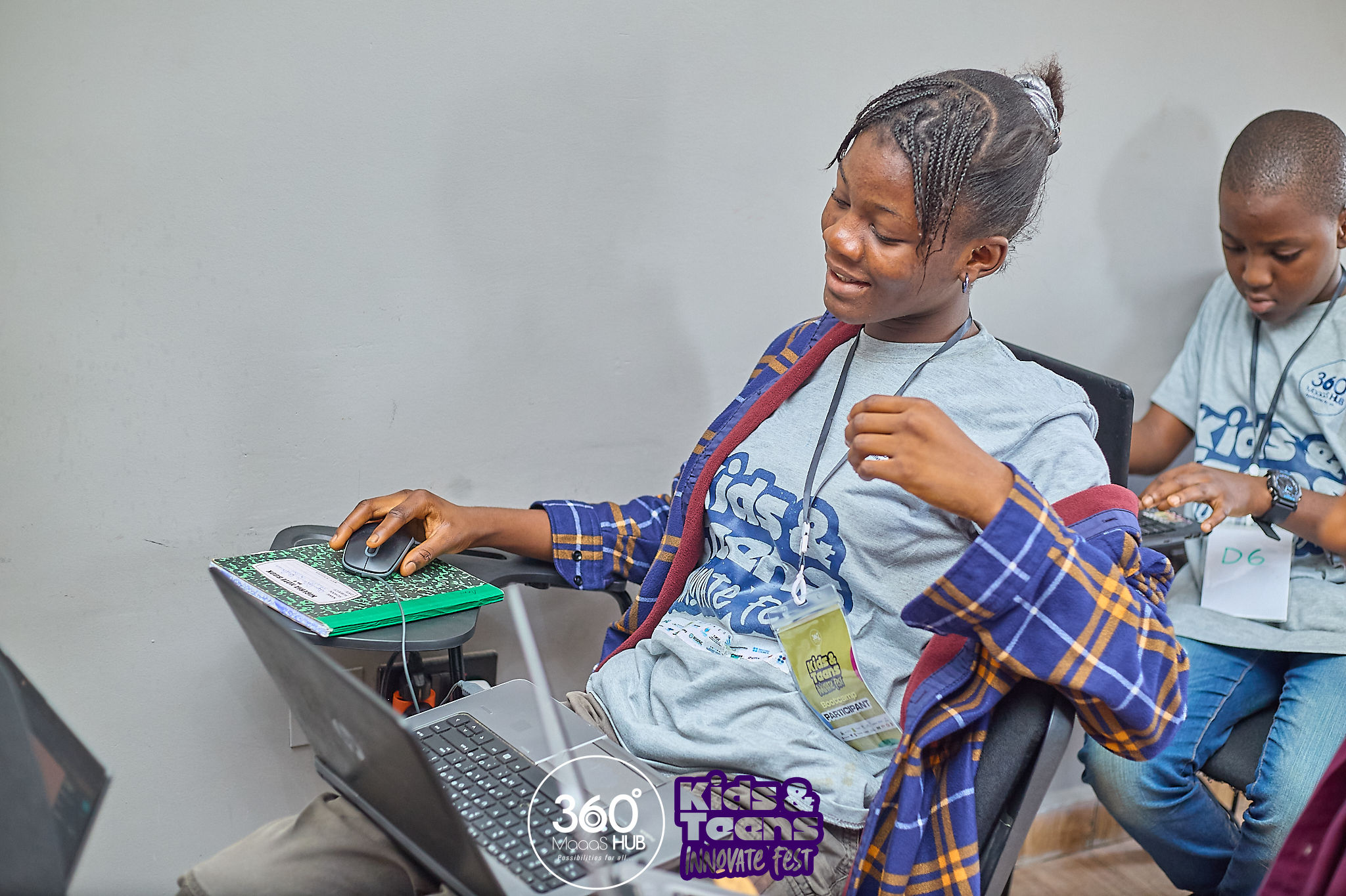 Student coding on a laptop