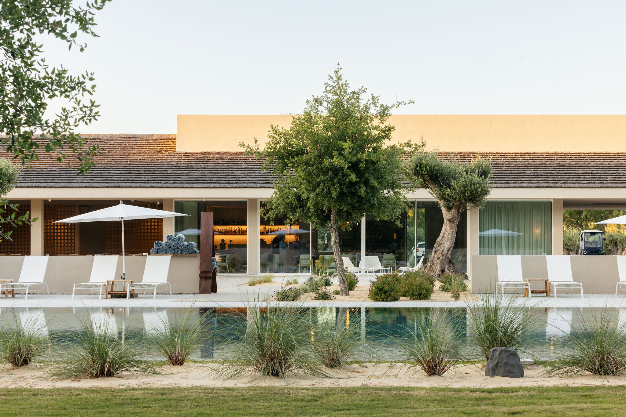 Pool, tree and pavilion at Spatia Comporta