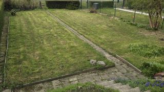Maison 3 façades avec garage, terrasse et jardin 