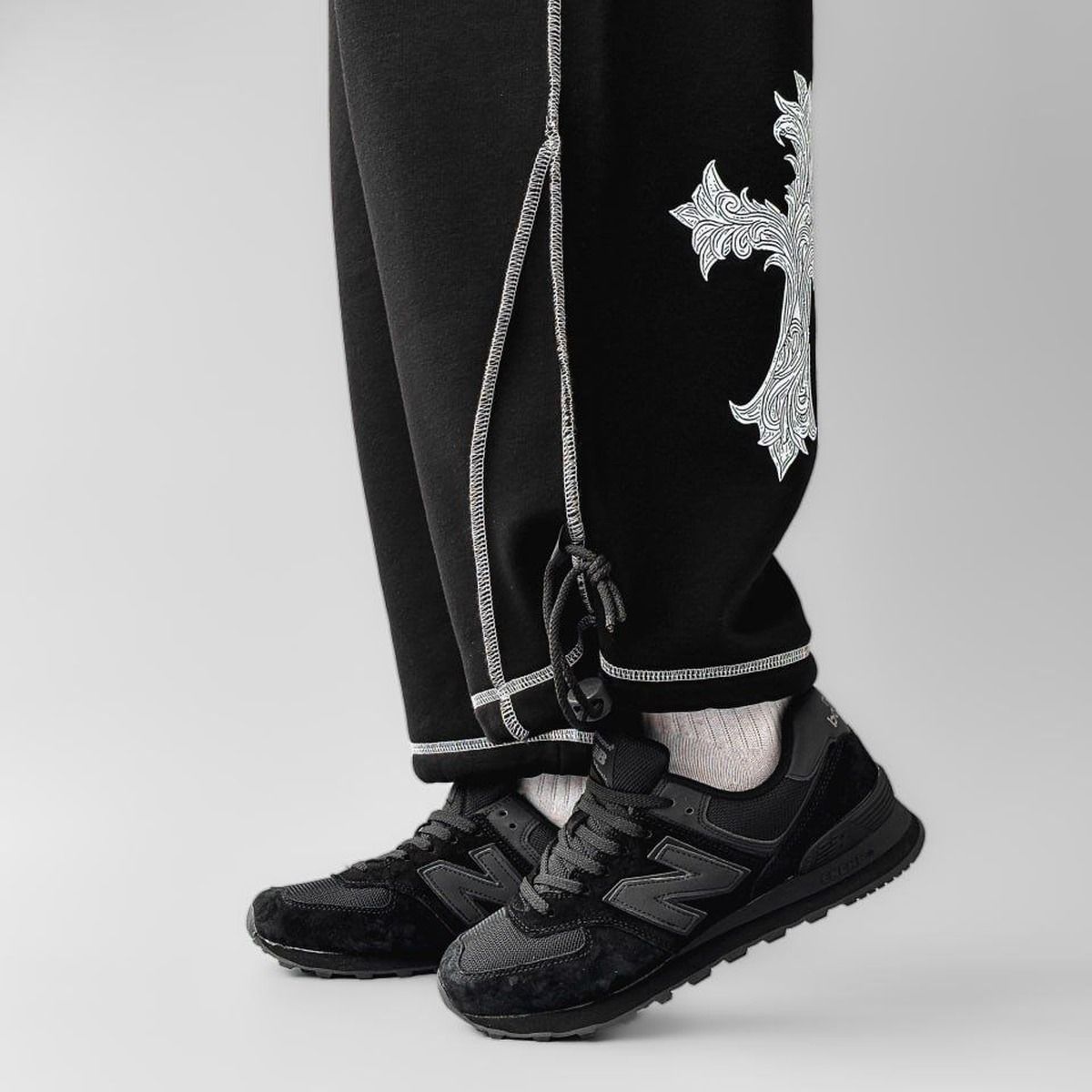 New Balance 574 Triple Black Reflective