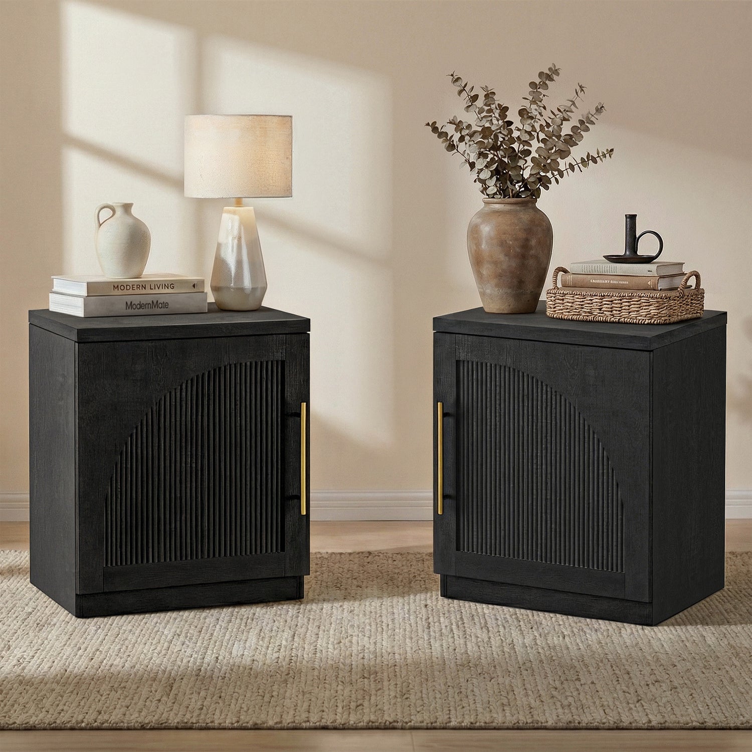 Two black cabinets shown in a furnished room