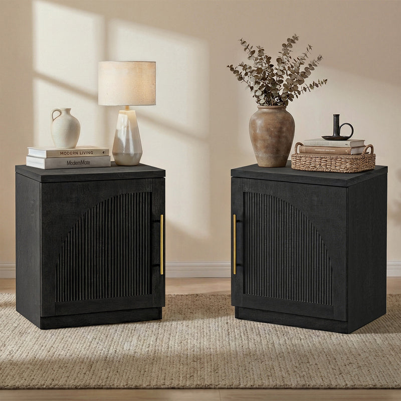 Two black cabinets shown in a furnished room