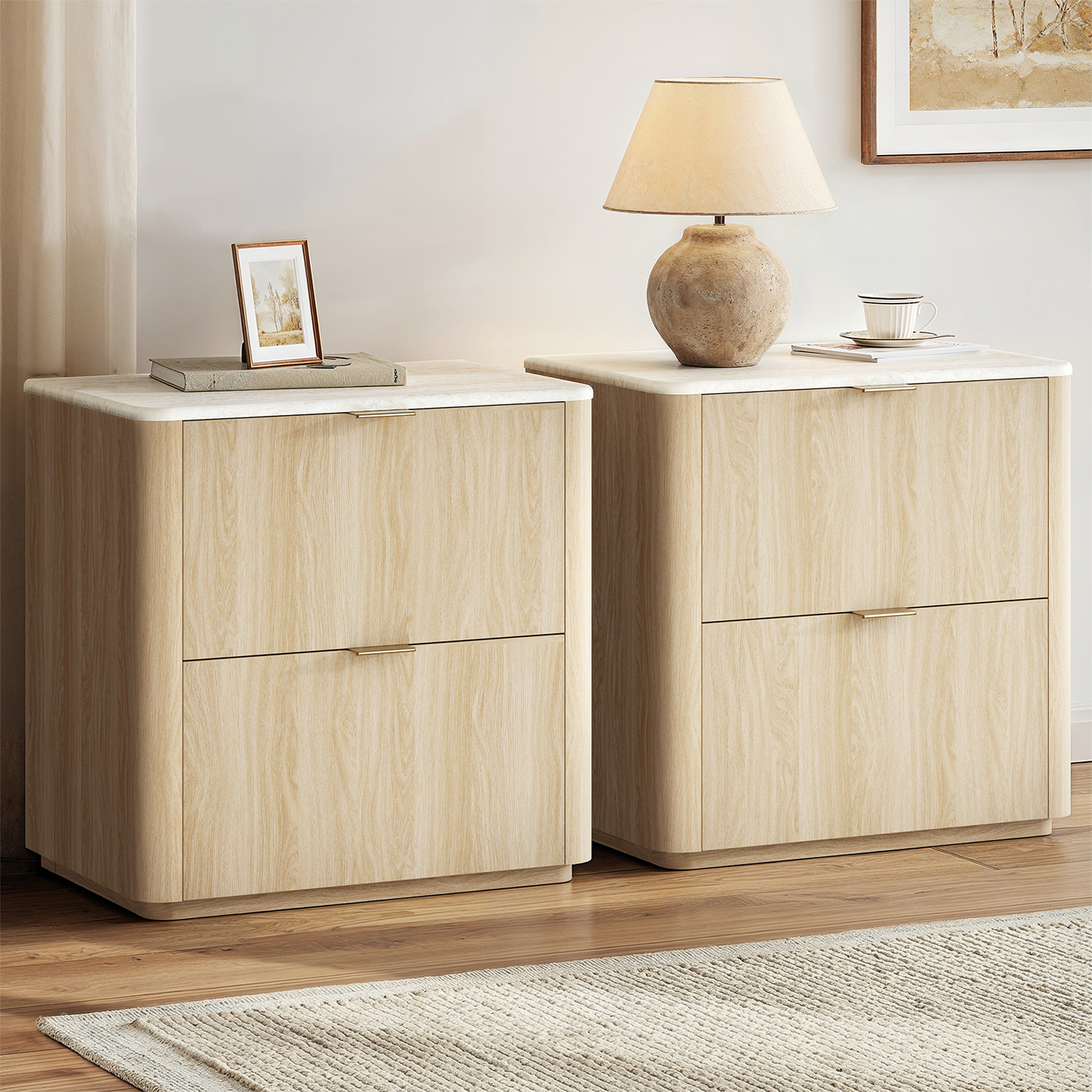 Two matching light wood-grain cabinets have rounded corners, Each front has two broad panels with slim pulls