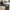 [Pre-Sale] 63-Inch Wide Black Elm Veneer Executive Office Desk with Built-In Charging Station