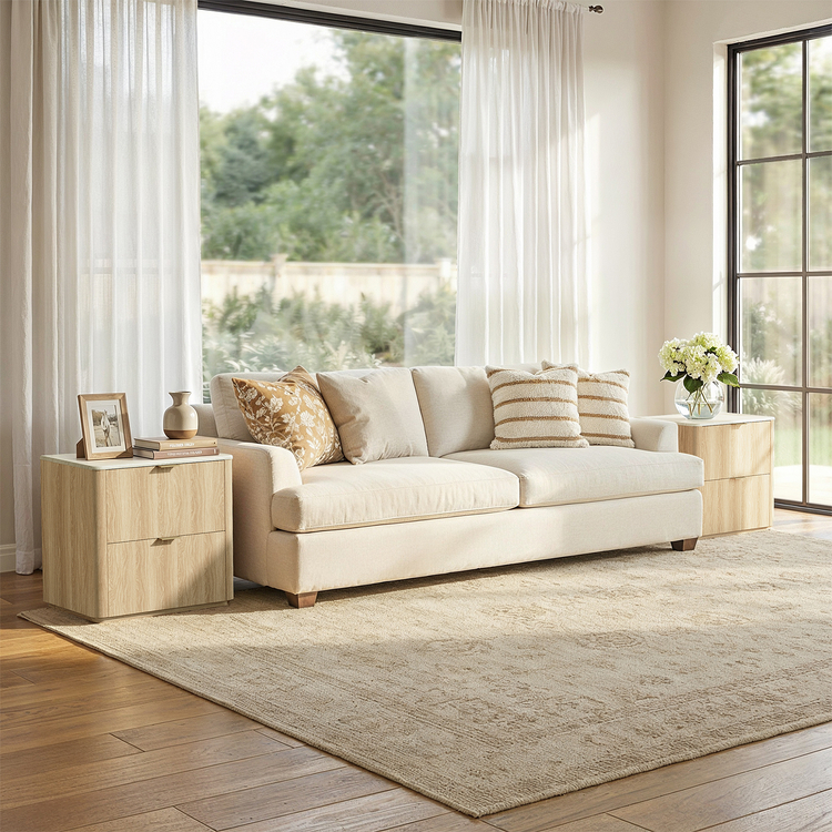 Cream sofa with side tables shown in a living room