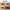 70-Inch Natural Oak-Look TV Stand with Charging Station and Adjustable Shelves, Media Console for TVs Up to 75 Inches