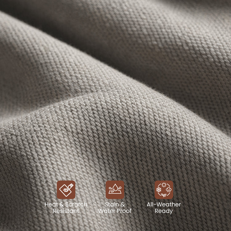 A close-up shows gray woven fabric draped in soft folds