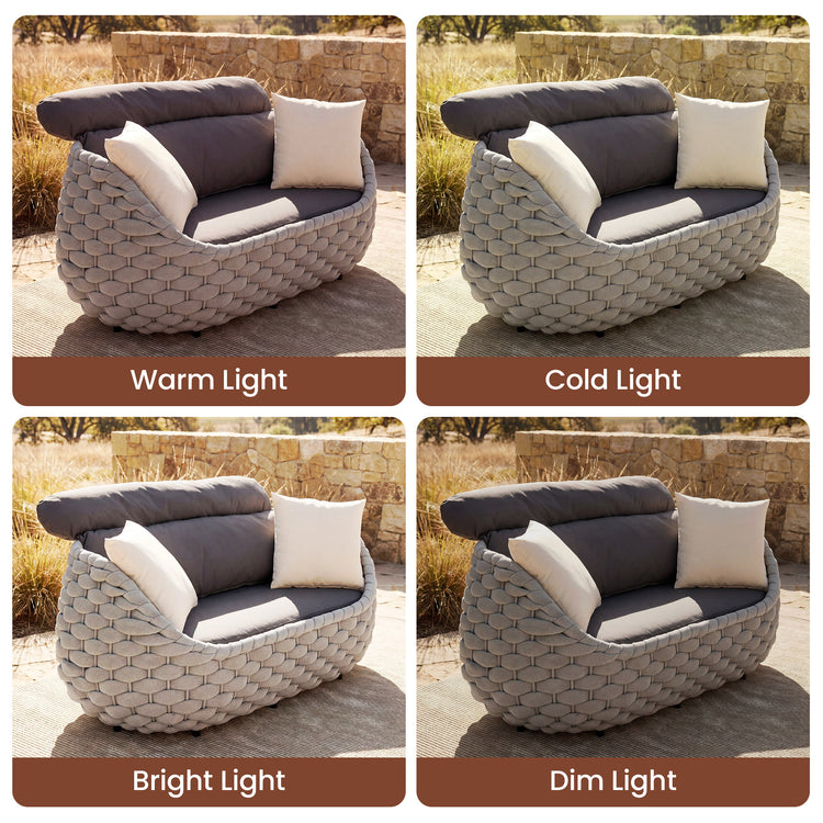 Four panels show a gray woven outdoor loveseat under different lighting, Dark cushions and two pale pillows fill each view