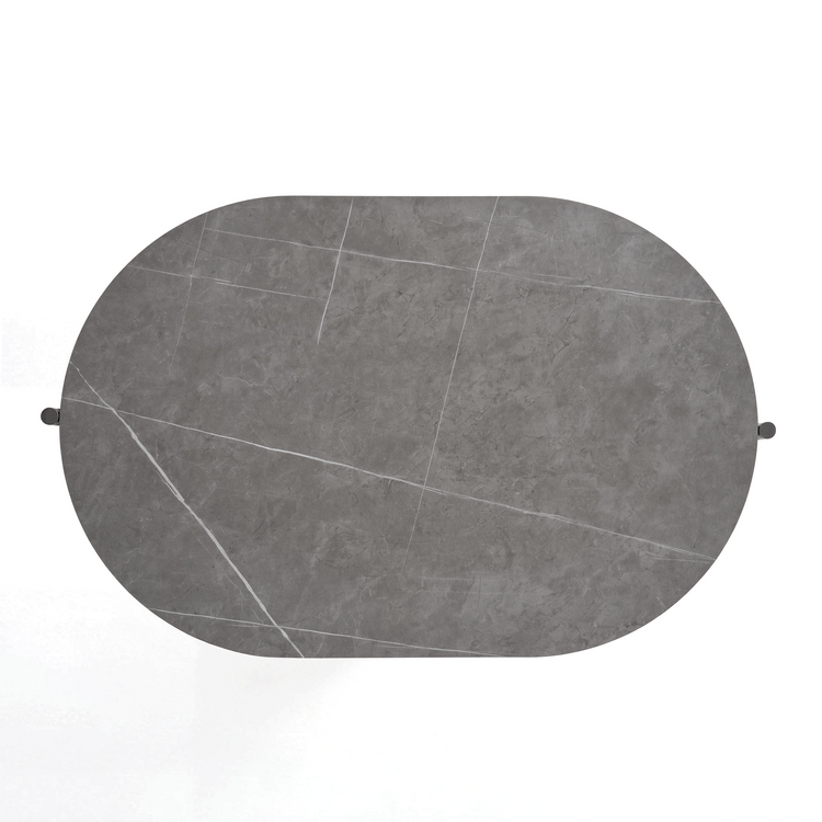 Top-down view of a gray rounded rectangular tabletop with white veining